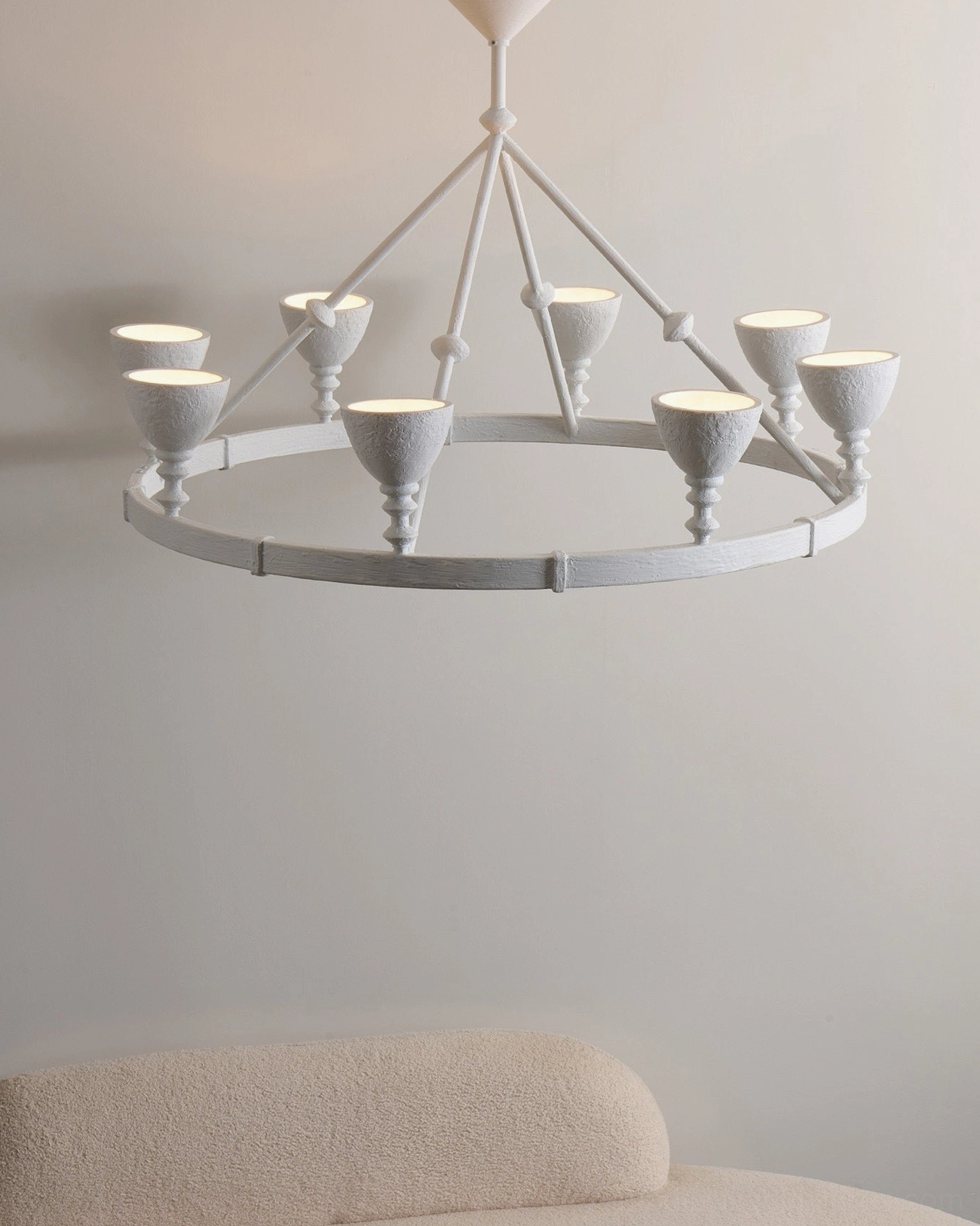 Cremora white ring chandelier in indoor space with beige upholstered furniture classic farmhouse style lighting