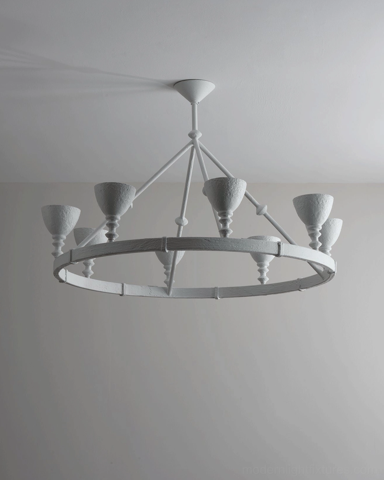 Cremora chandelier overhead angle showing light gray textured matte finish with rustic minimalist sculptural design