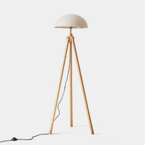 Crescent wooden tripod floor lamp with white half-dome shade in minimalist Nordic style, front studio view