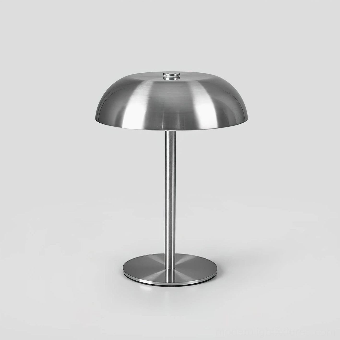 Crescent LED table lamp with round metal base, slim metal pole, and dome shade design