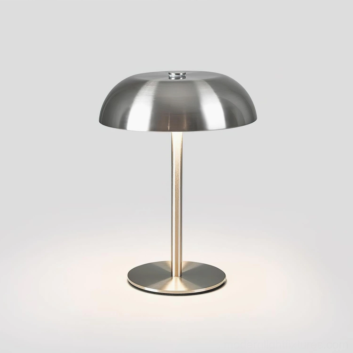 Illuminated Crescent LED table lamp emitting warm ambient light, showcasing three-color changing capability