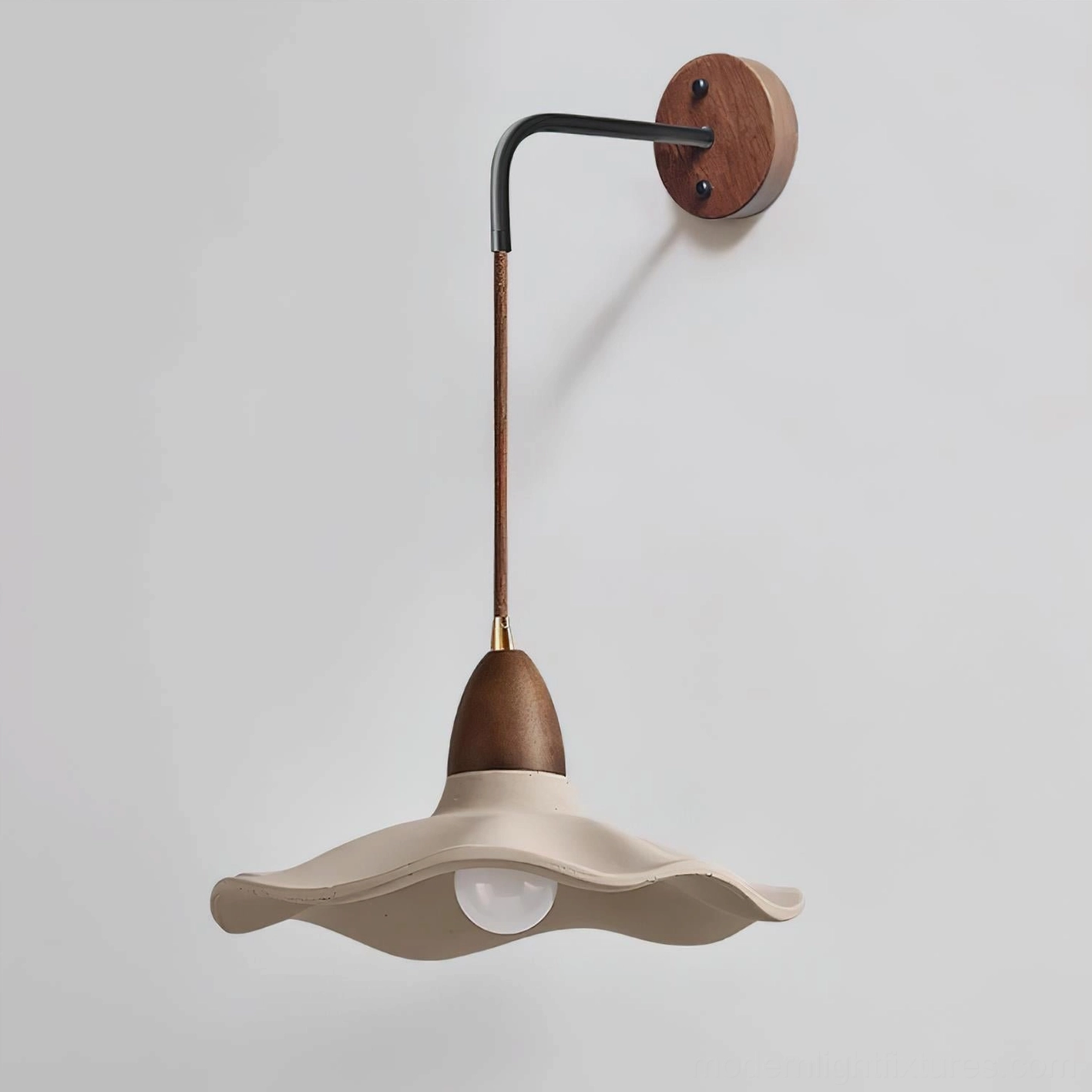 Modern crested wave wall sconce with wooden mounting base and dark metal rod, studio product photography