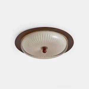 Crestfold pleated ceiling lamp front overhead view showing ribbed acrylic dome with walnut wood accent base, modern light fixture close-up
