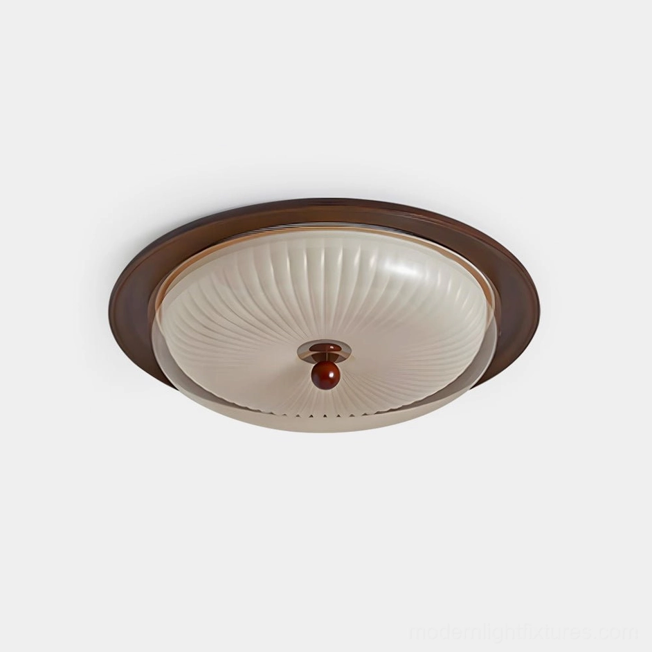 Crestfold pleated ceiling lamp front overhead view showing ribbed acrylic dome with walnut wood accent base, modern light fixture close-up