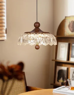Vintage modern pendant lamp overhead view in residential dining room with scalloped glass shade