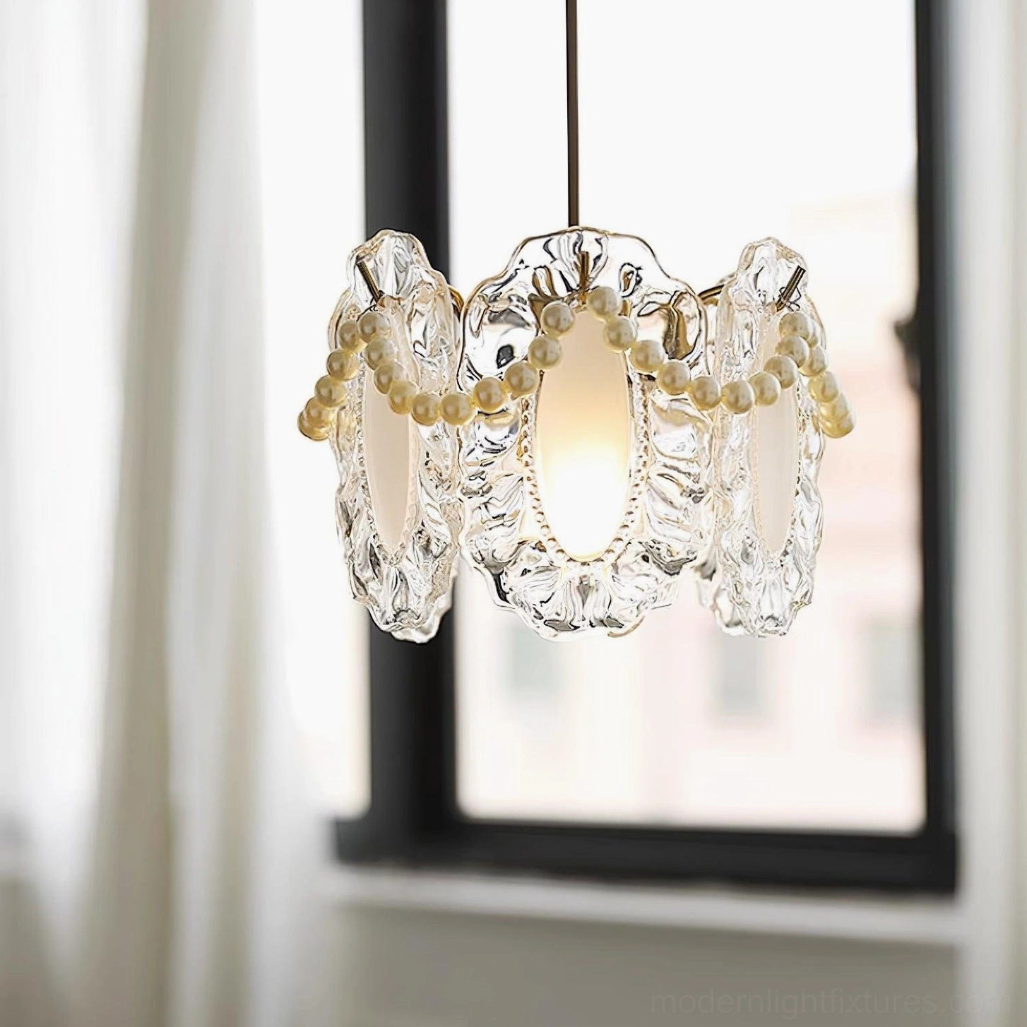 Crystal petal pendant light in clear and frosted glass options showing design versatility and color selections