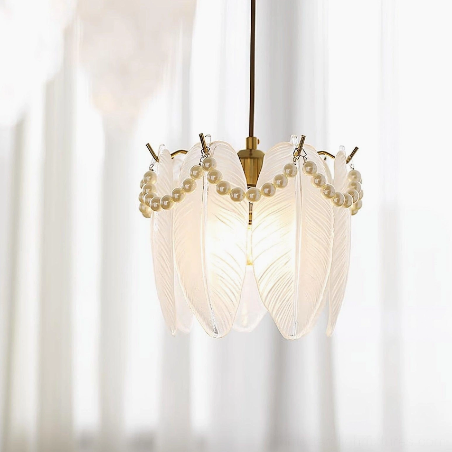 Crystal petal pendant light fixture detail showing intricate glass formations and pearl-trimmed edge design