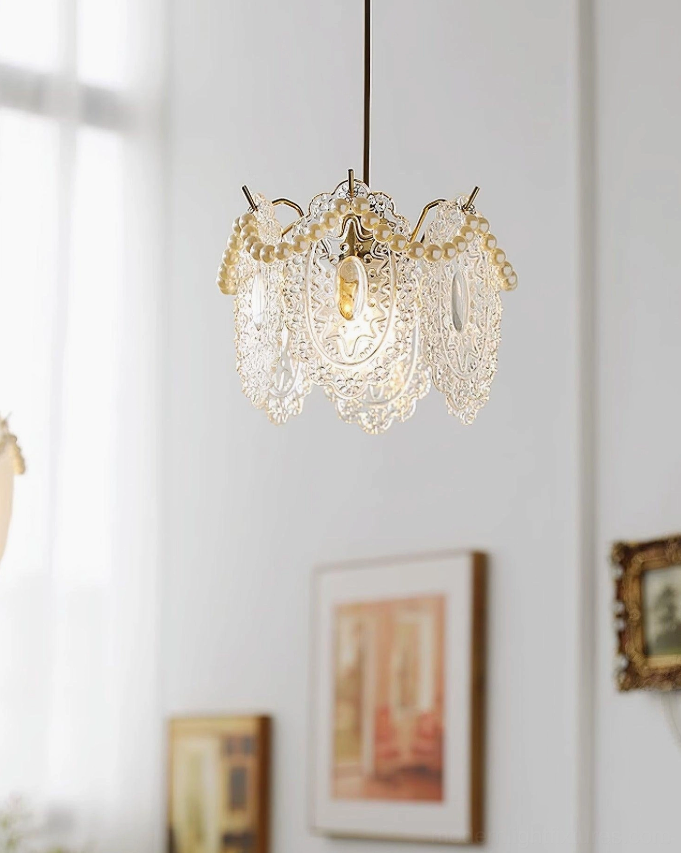 Crystal glass petal pendant light fixture mounted in minimalist dining space with warm illumination
