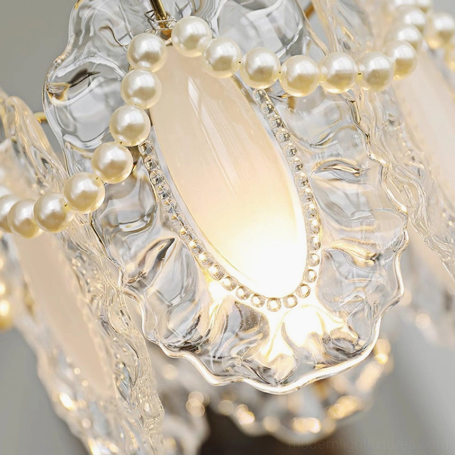 Crystal petal pendant light fixture demonstrating light refraction and warm color temperature illumination in home environment