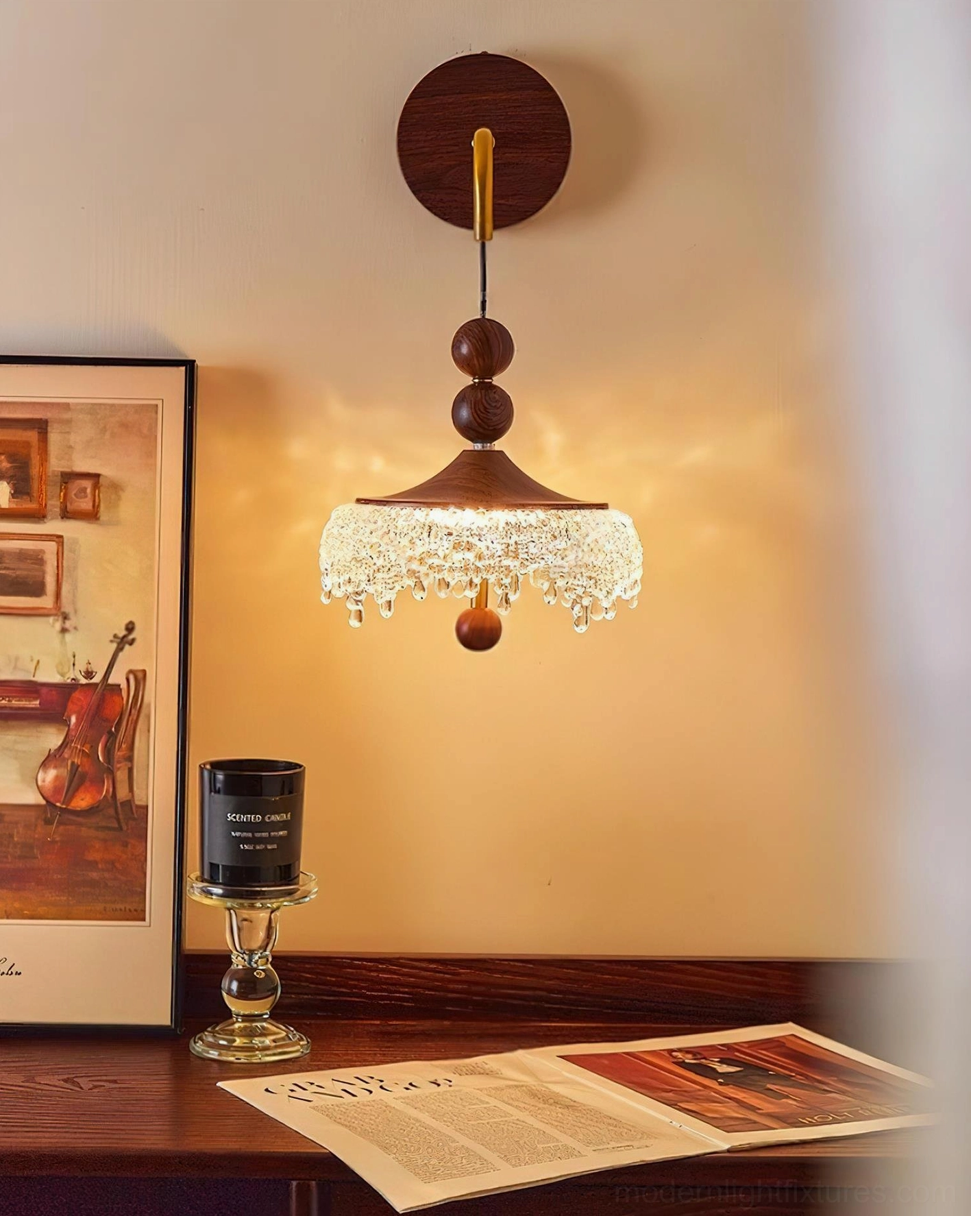 Crystal wall sconce front flat view in minimalist home setting paired with framed art and decorative candle