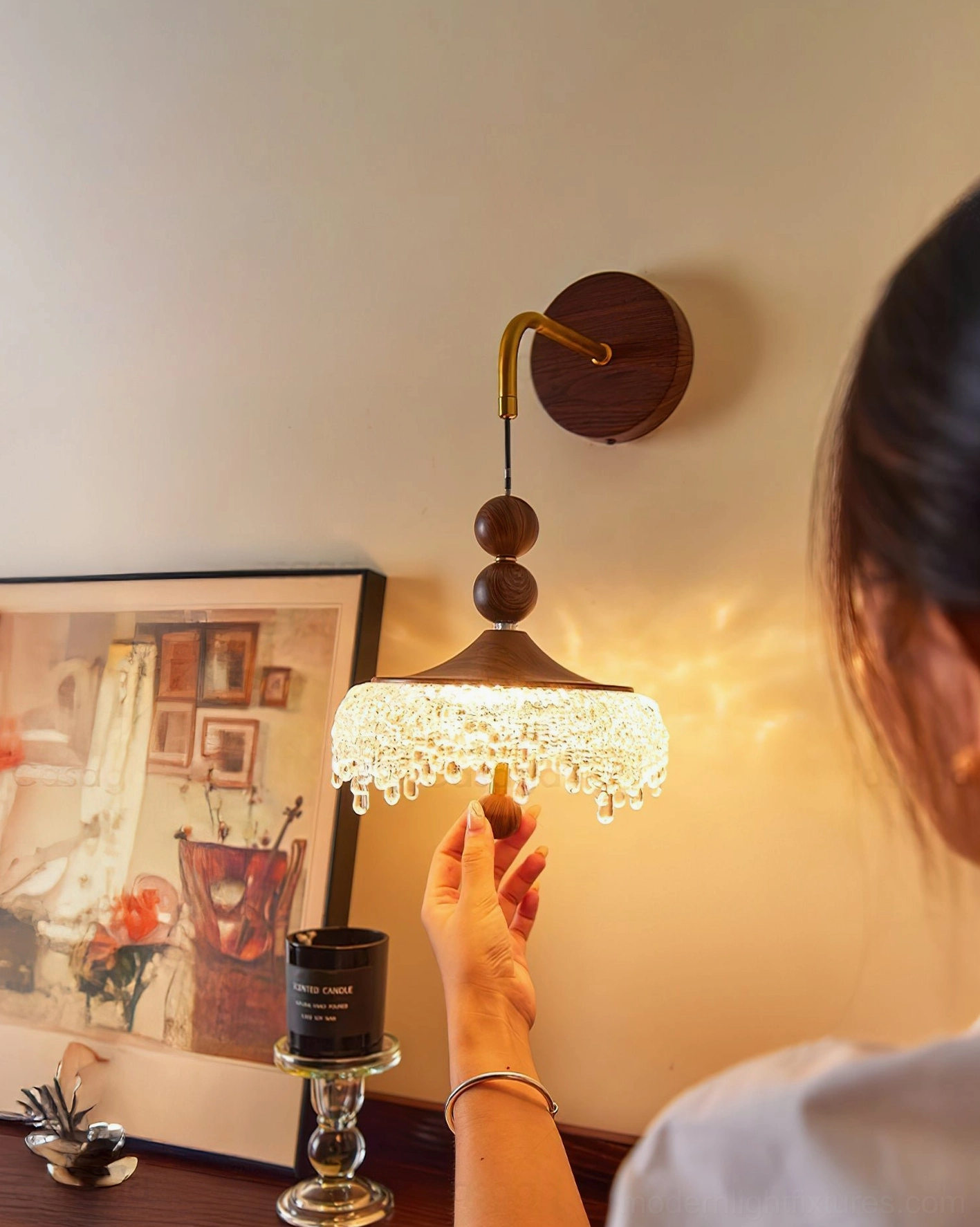 Crystal wall sconce three-quarter angle view in vintage home office setting showing product interaction and styling