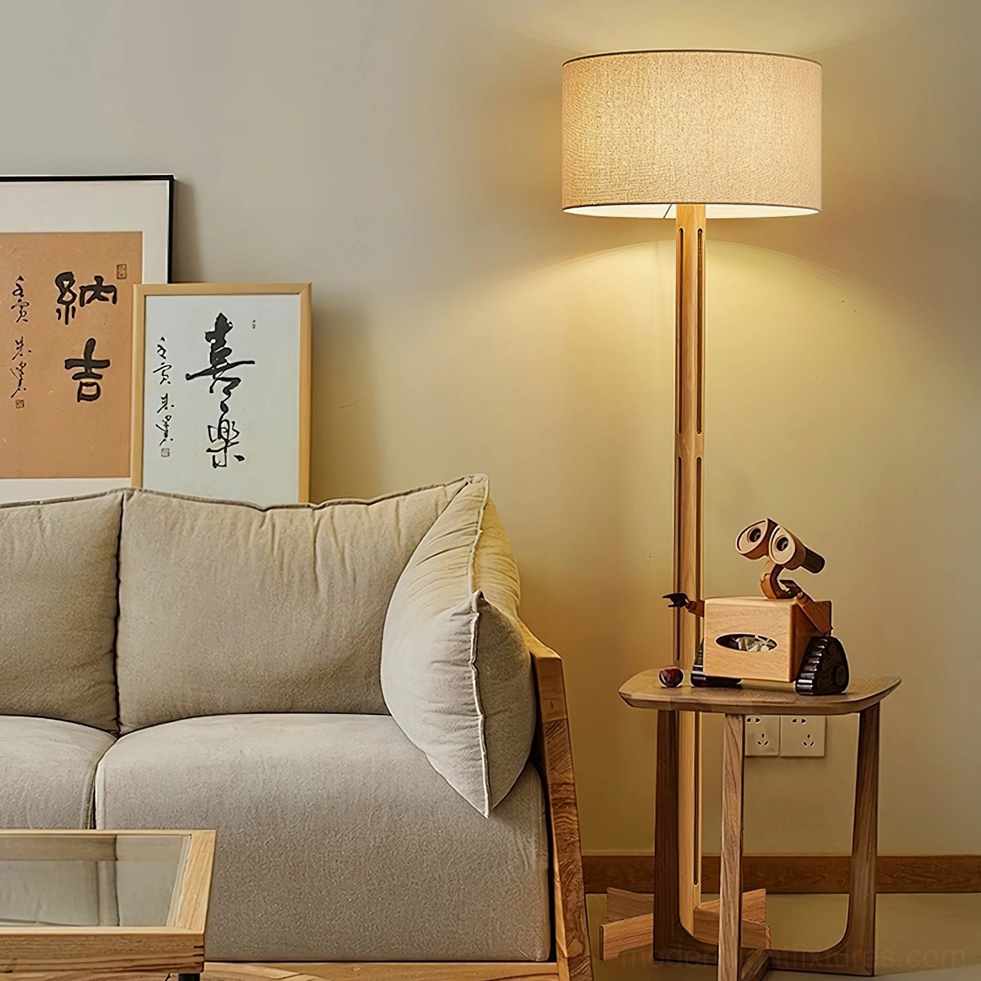 Culver wood floor lamp in contemporary living room with fabric sofa, demonstrating warm ambient lighting effect