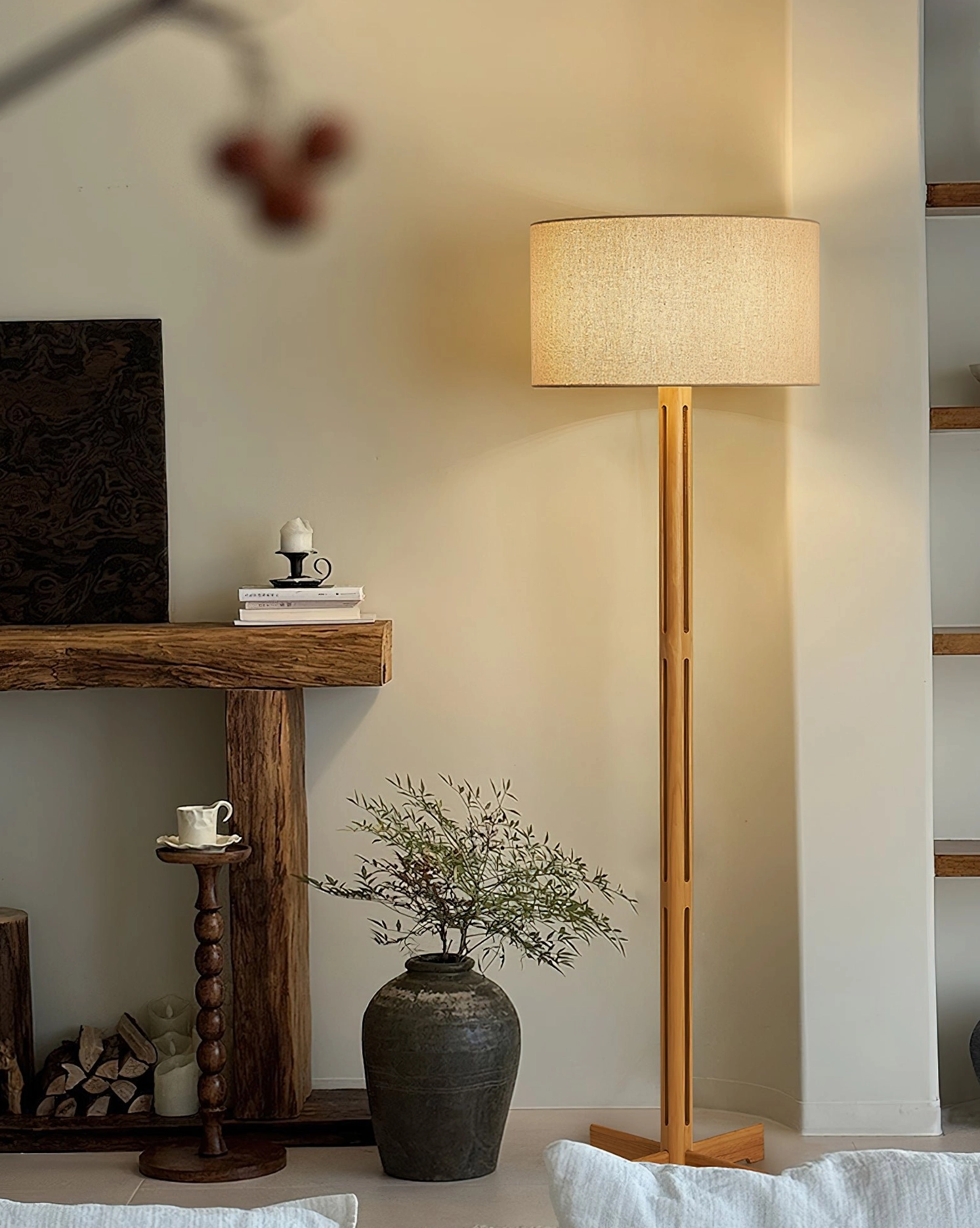 Culver wood floor lamp in vintage-inspired living room with warm glow, wooden furniture, and potted plant decor