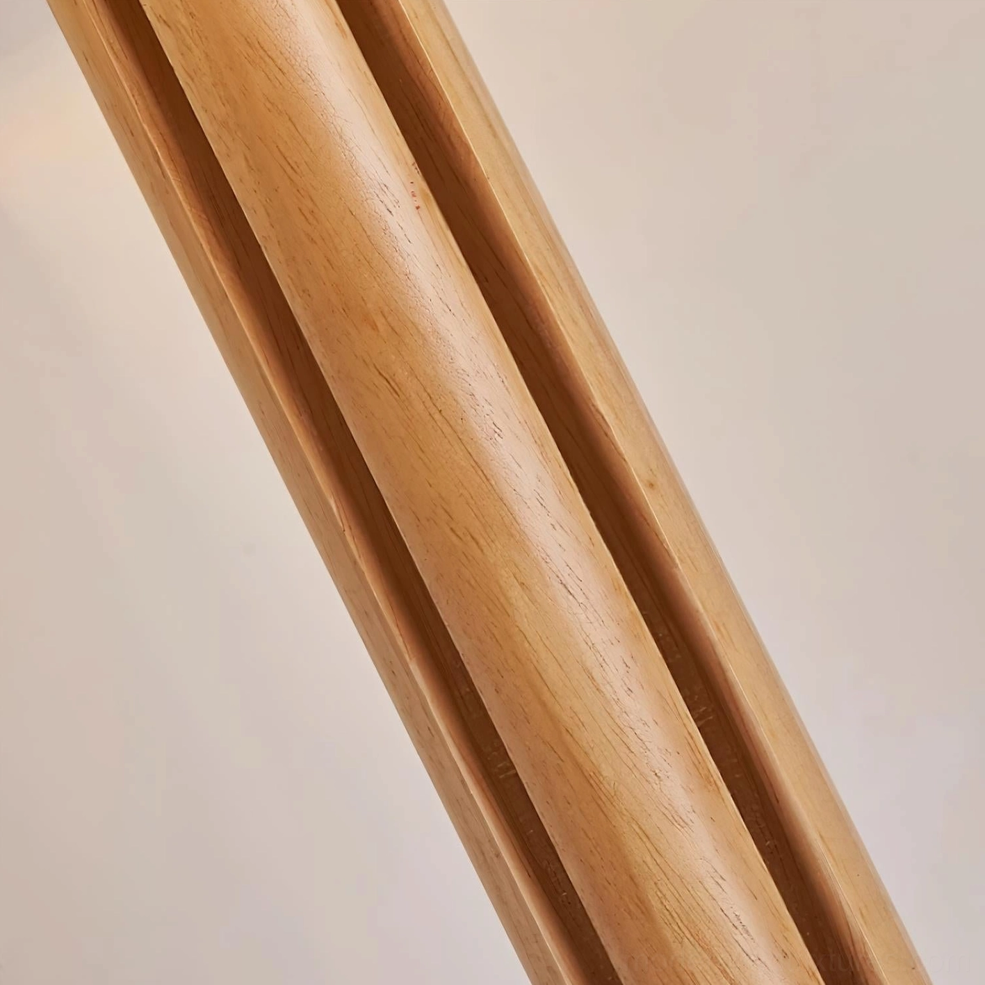 Culver wood floor lamp with perforated wooden pole and stable X-shaped base Scandinavian minimalist design