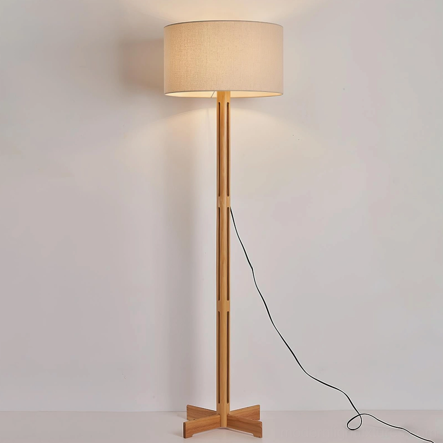 Culver wood floor lamp with slotted wooden pole and linen shade showing natural wood finish and perforated details