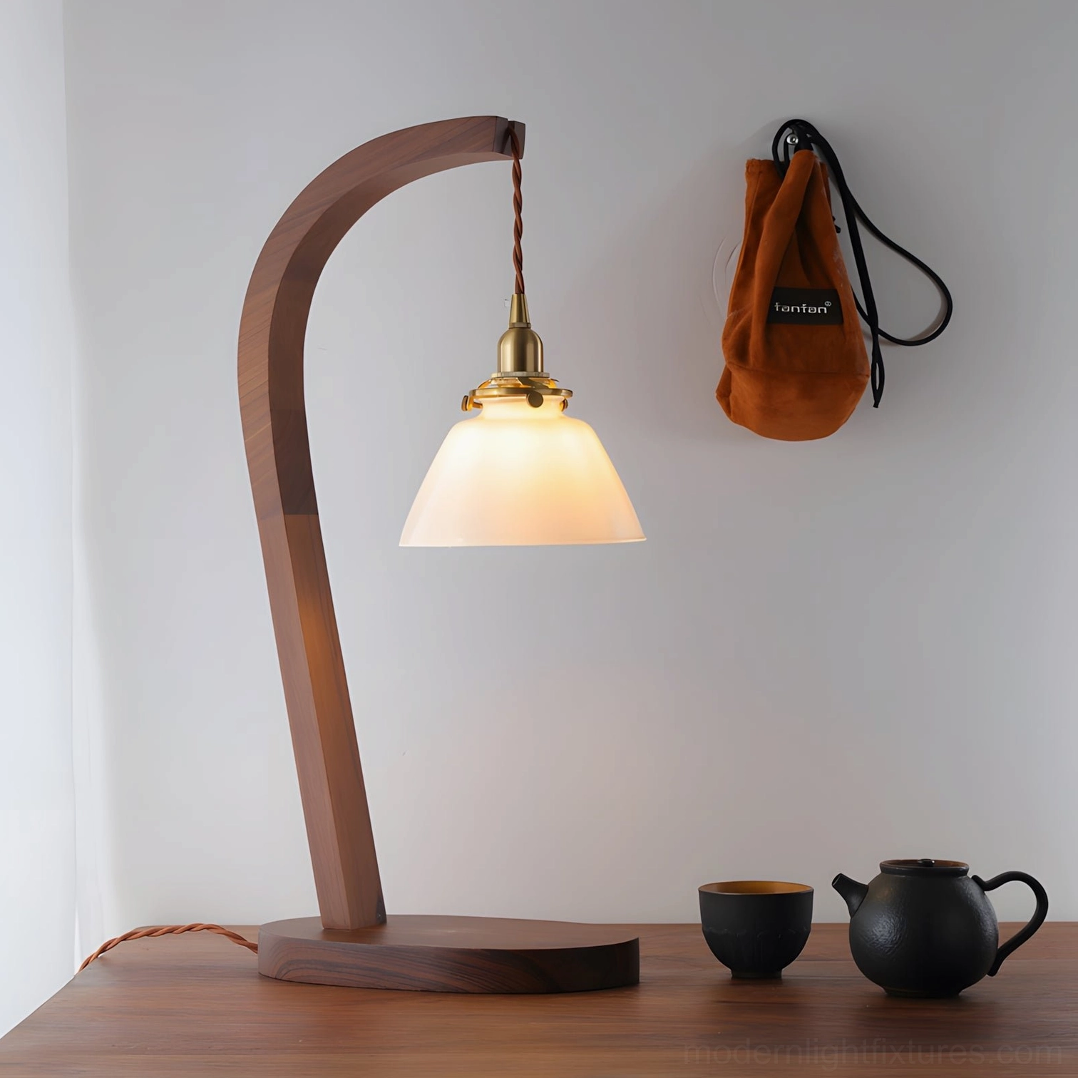 Curved walnut wood stem table lamp mid-century modern design aesthetic