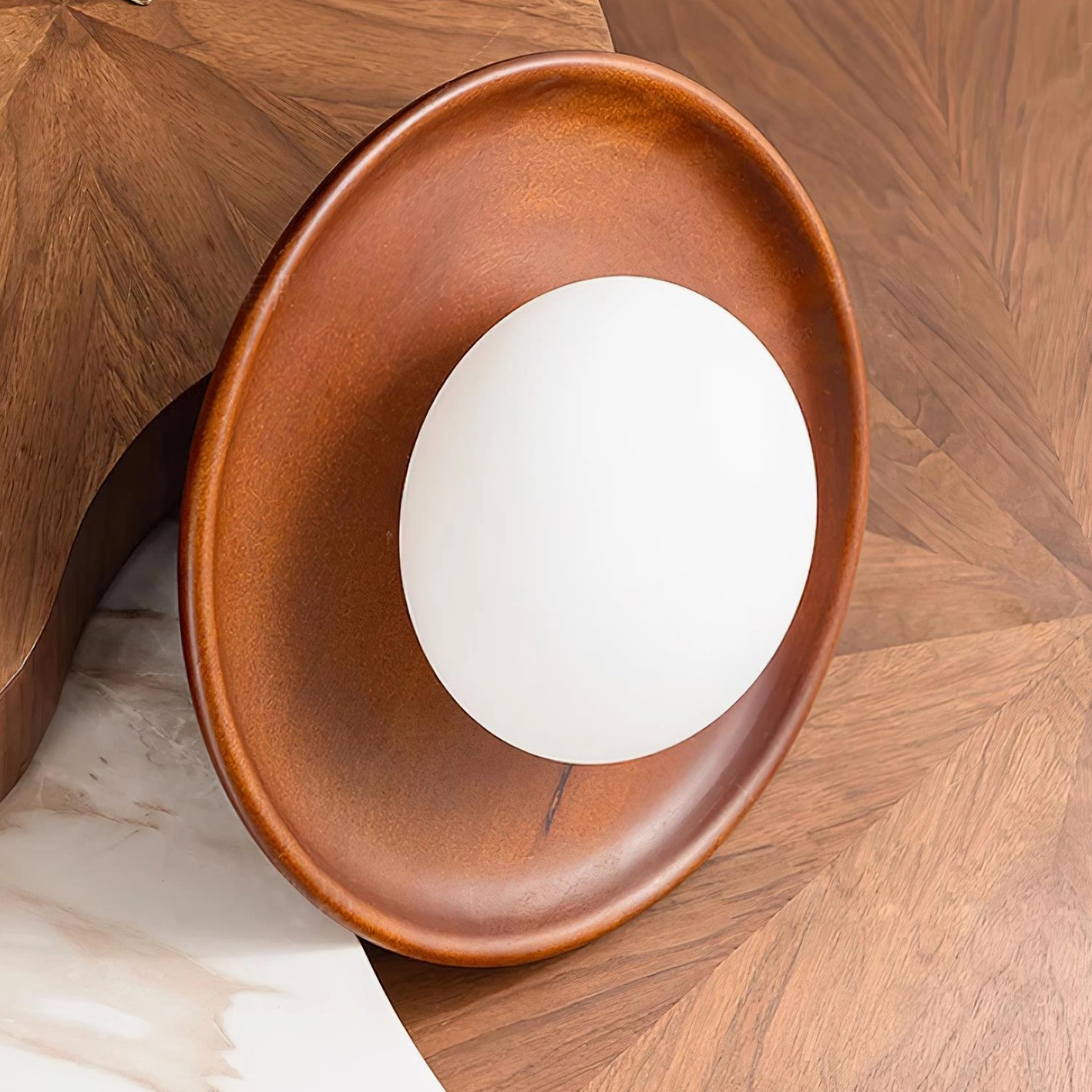 Damp-rated wall sconce suitable for bathroom and covered outdoor installation