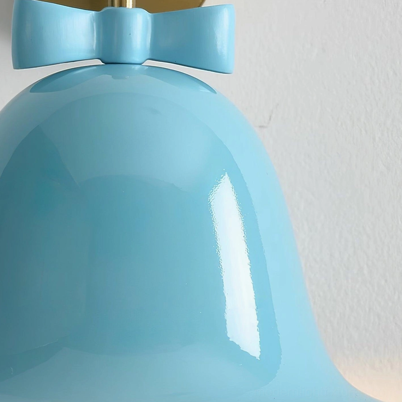 Damp-rated bell-shaped ceramic wall sconce suitable for bathrooms and covered outdoor spaces