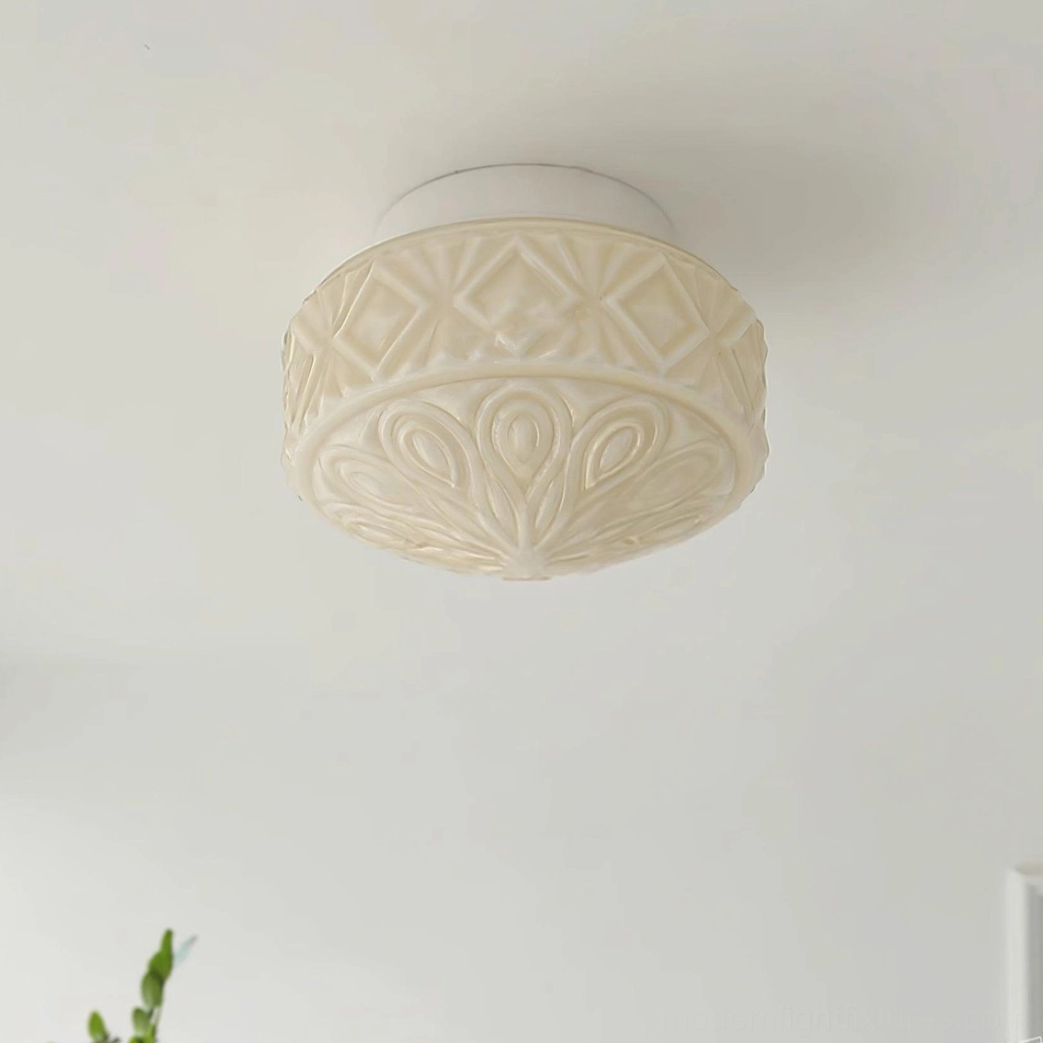 Damp-rated vintage glass ceiling light fixture suitable for bathroom or covered outdoor installation, embossed detail view