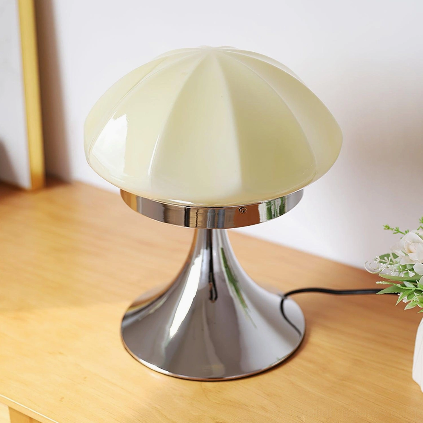Dario mushroom table lamp faceted glass shade with chrome base showing light refraction and diffusion