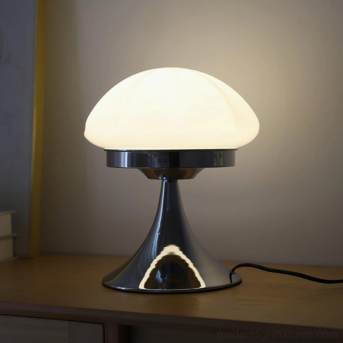 Dario mushroom table lamp styled in minimalist modern bedroom with white faceted shade and chrome stand