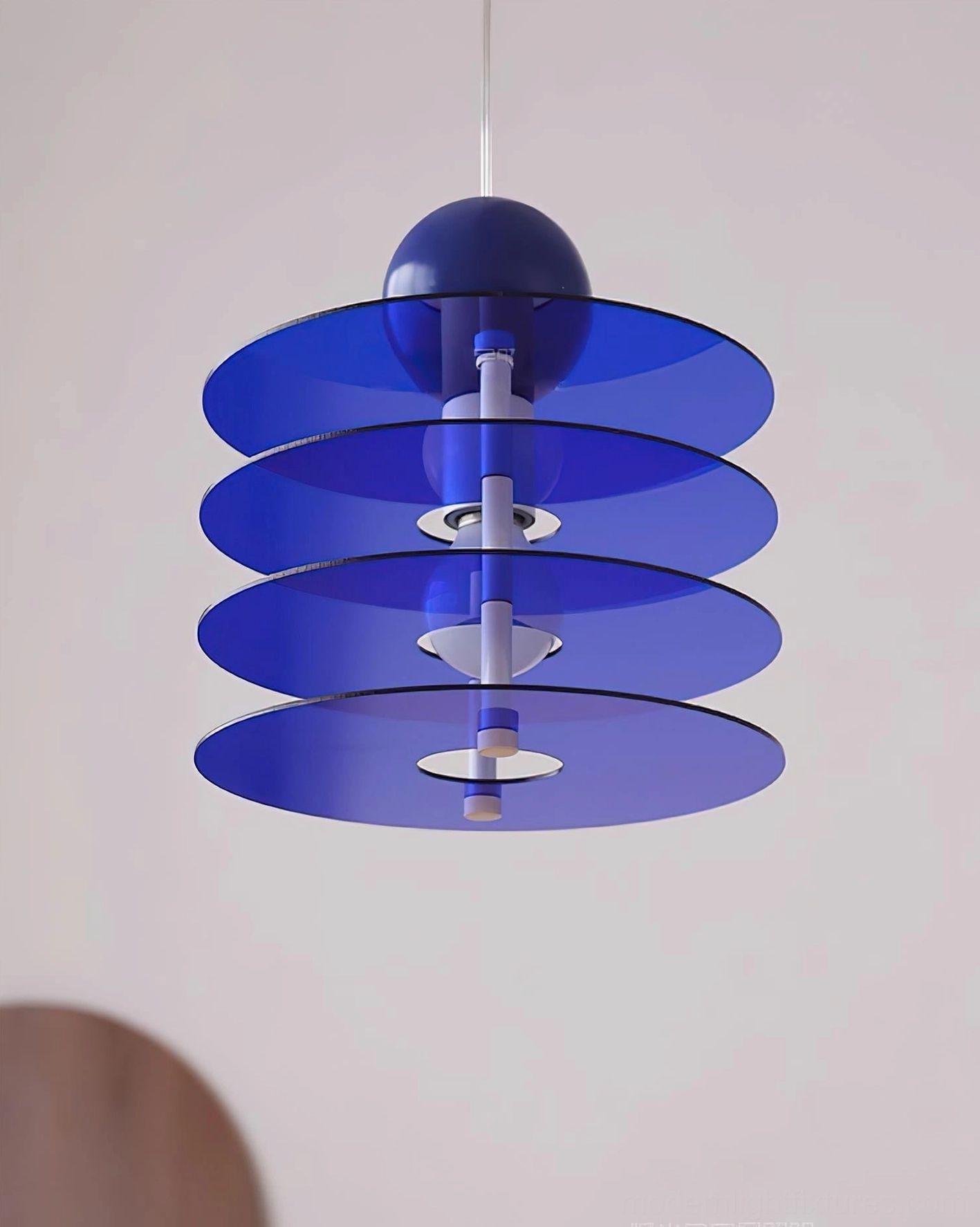 Dark blue layered acrylic pendant light with thick transparent disc layers
