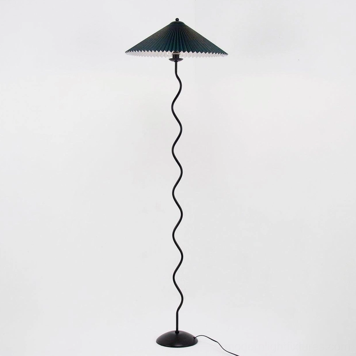 Dark green squiggle wave floor lamp - rich modern lighting design for eclectic and artistic interiors