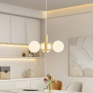 Darla dual orb pendant lamp in cream dining kitchen scene creating warm ambient lighting