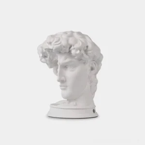 Michelangelo David sculptural table lamp with matte white plaster finish, three-quarter left profile view showing classical art deco design