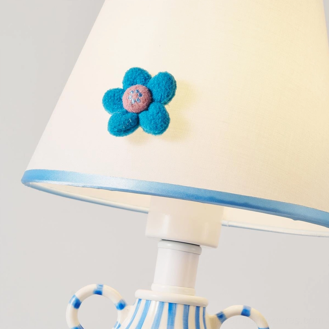 Sculptural ceramic table lamp with blue and white stripes - decorative lighting fixture