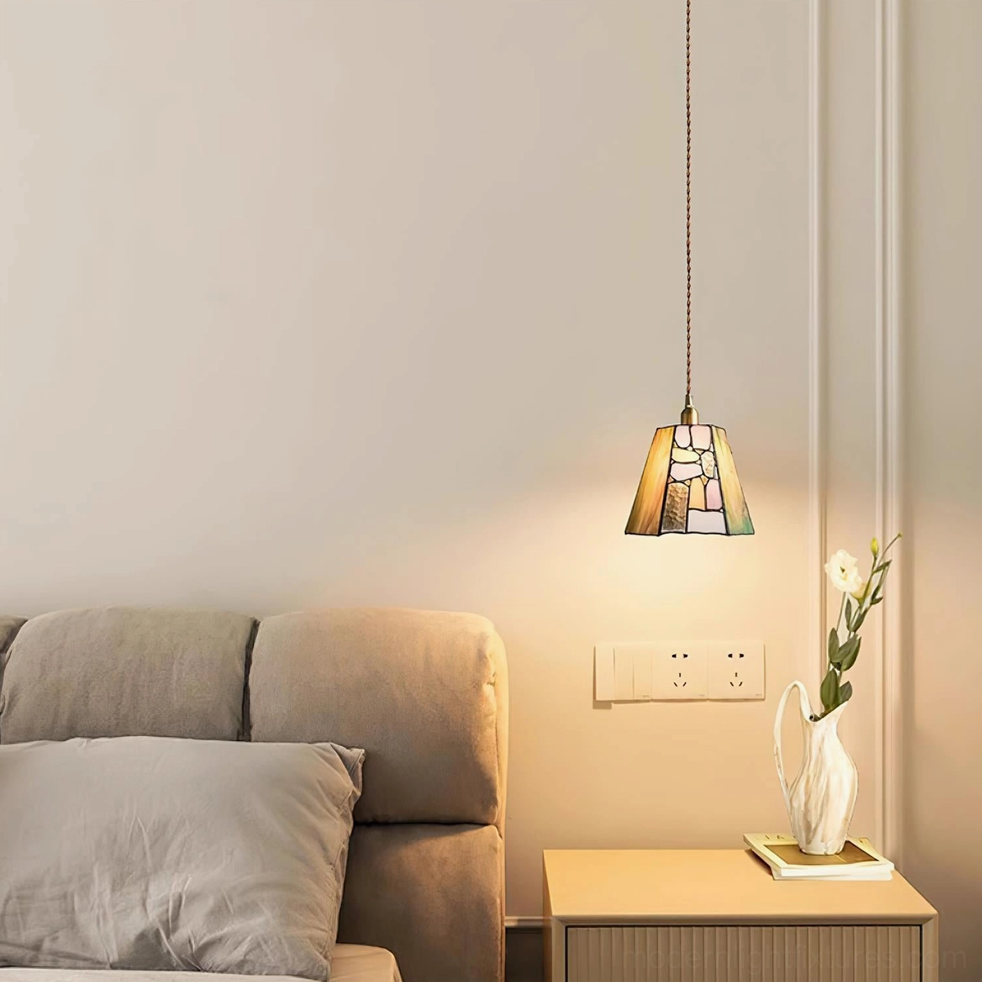 Decorative glass pendant light suitable for dining rooms and contemporary home interiors