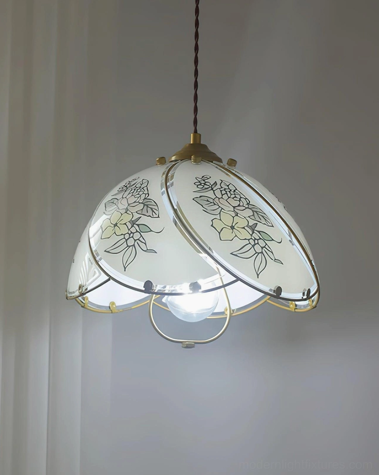Decorative lily floral pendant light with golden brass frame, complete fixture photography