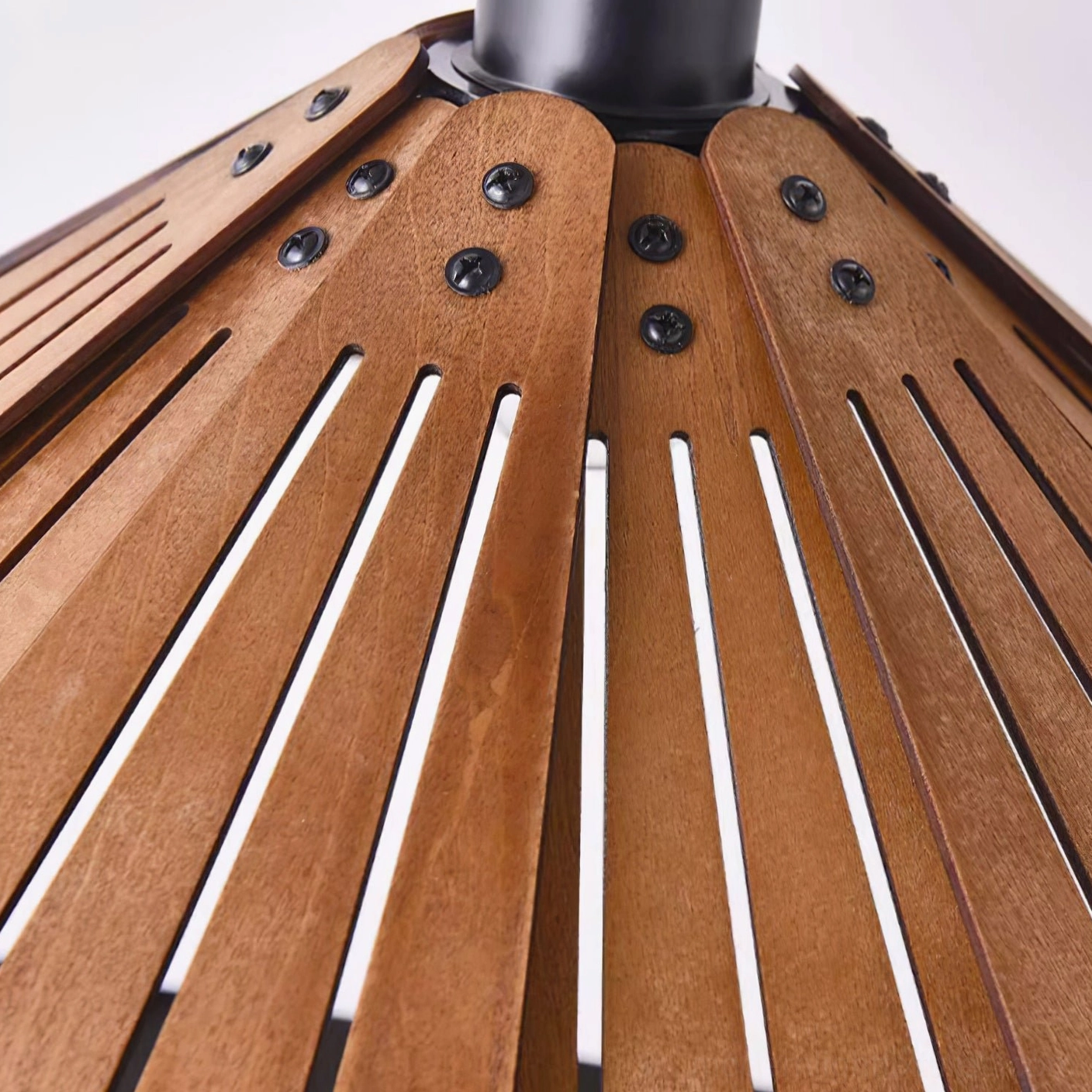 Delfina wood pendant lamp creating warm gathering space above dining setting