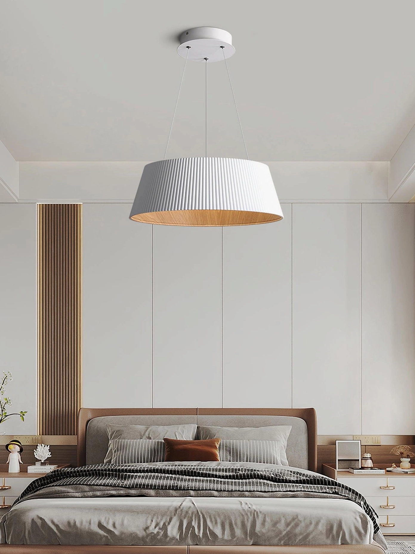 Delta pleated drum pendant light showing warm wood-toned interior illumination detail