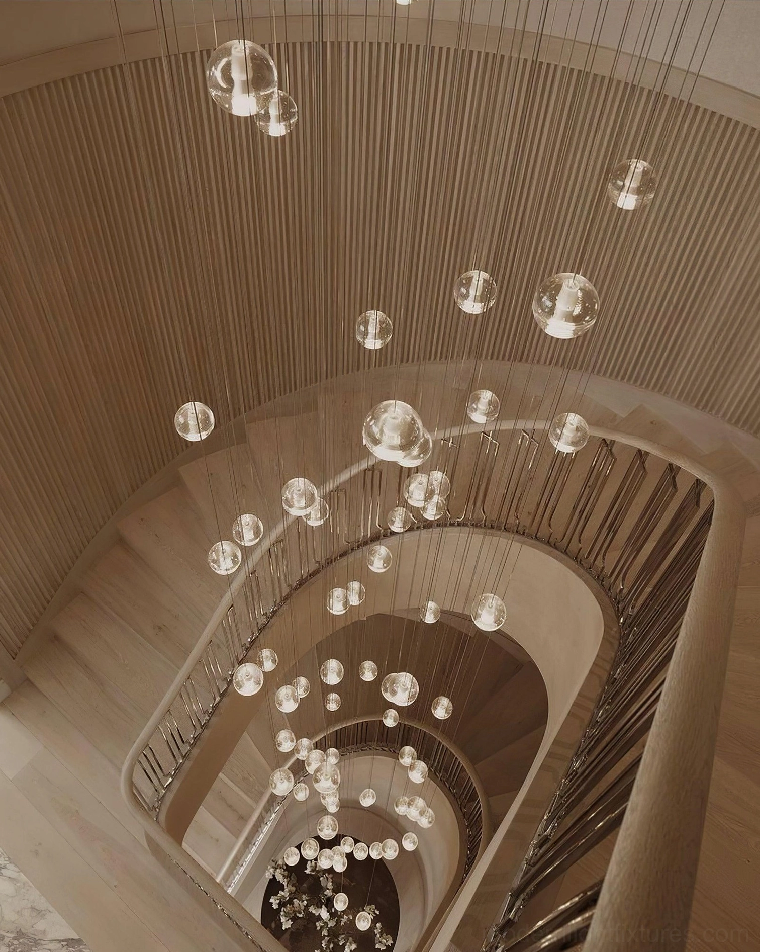 Designer crystal pendant chandelier with artistic light refraction and sophisticated ambiance
