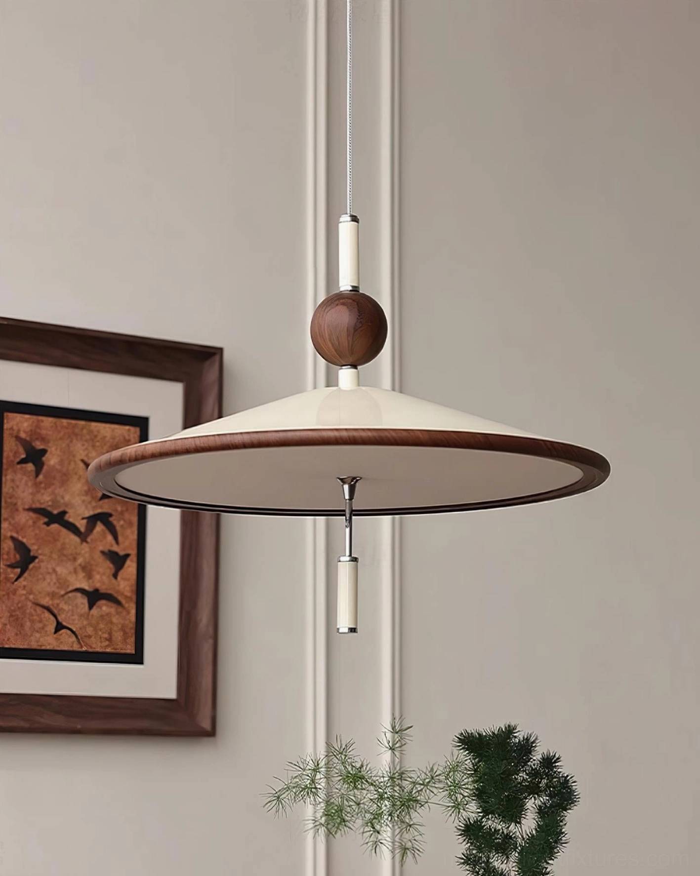 Devon mid-century modern pendant light in minimalist interior with wall art and framed decor