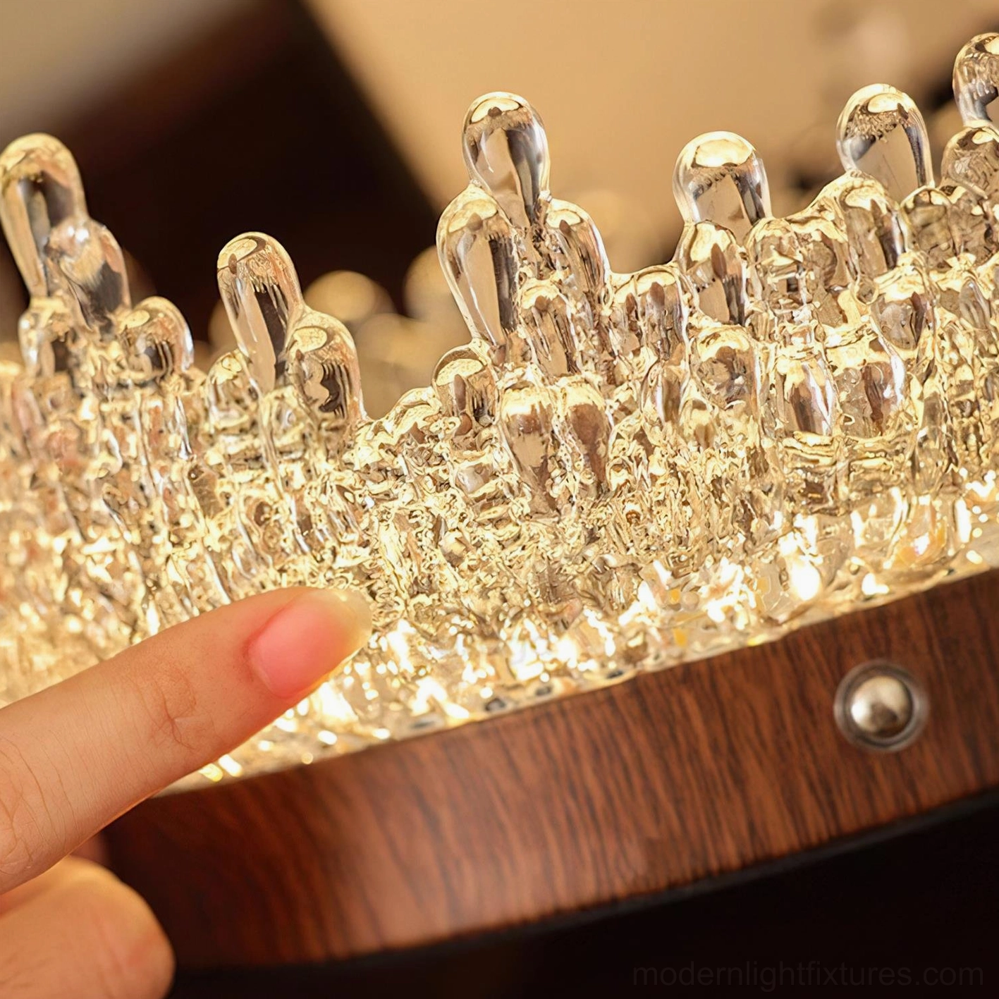 Close-up detail of Dewdrop Halo table lamp crystal acrylic trim walnut base metal hardware