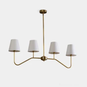 Diana 4-light linear chandelier in brass with white tapered fabric shades, front view against studio background