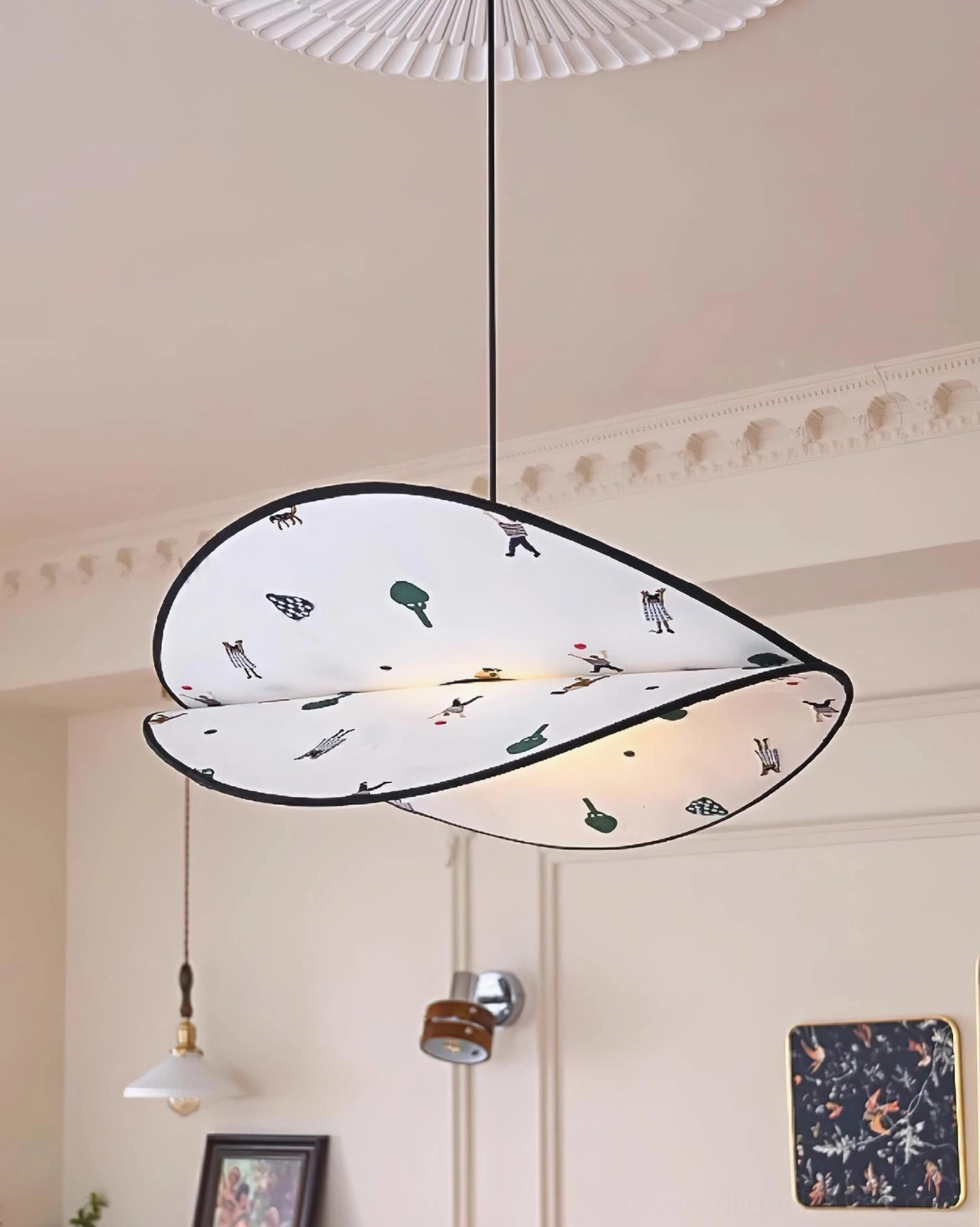 Modern petal-shaped fabric pendant light in decorated residential living room with neutral warm home style