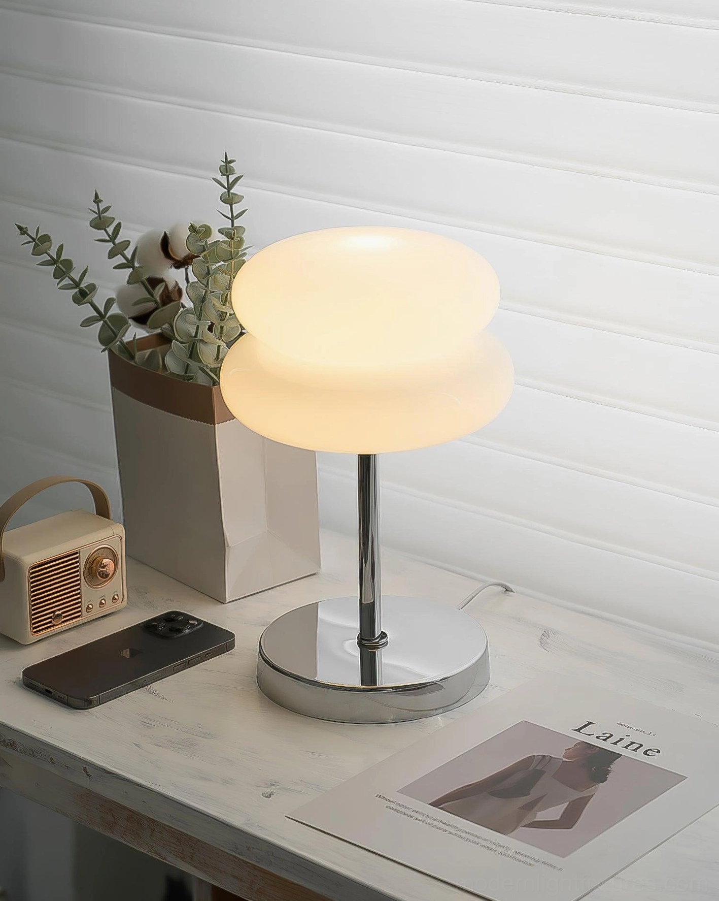 Minimalist glass table lamp with dimmer switch compatibility in contemporary bedroom