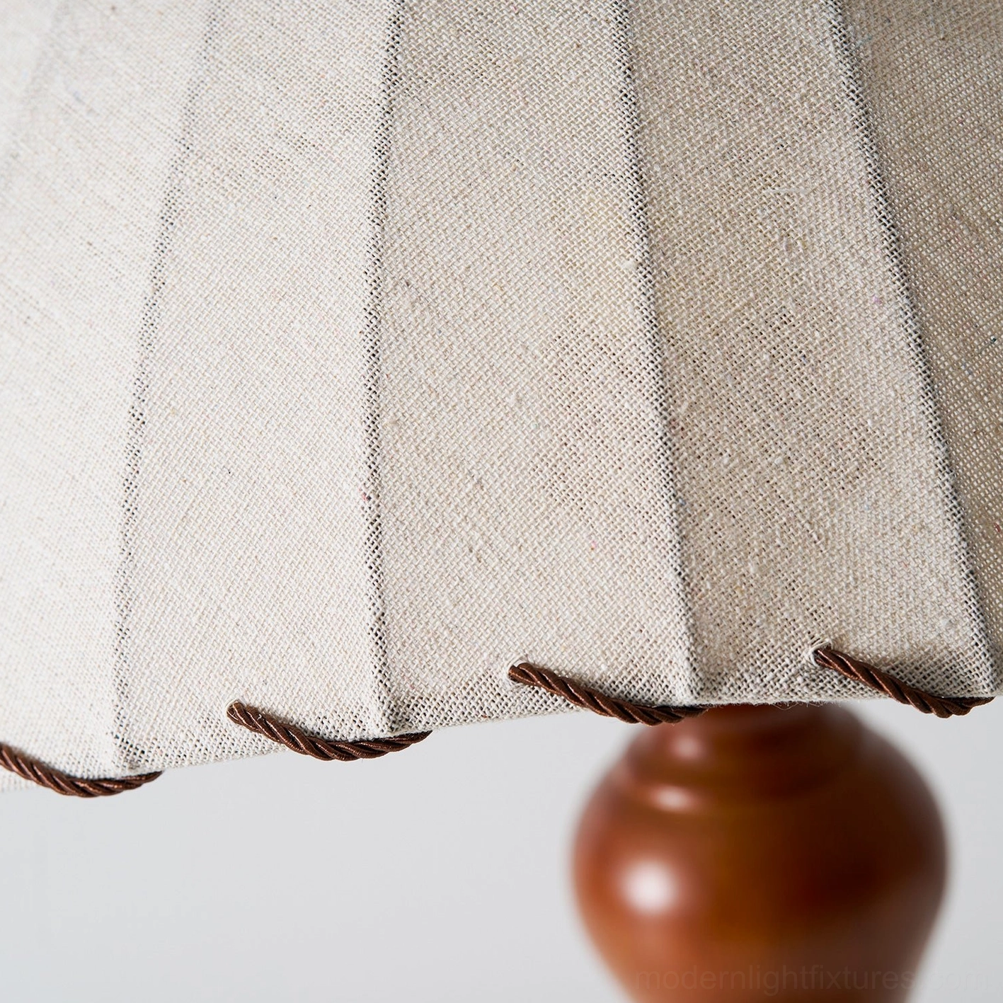 Dimmer compatible table lamp with push-button switch control and pleated shade design