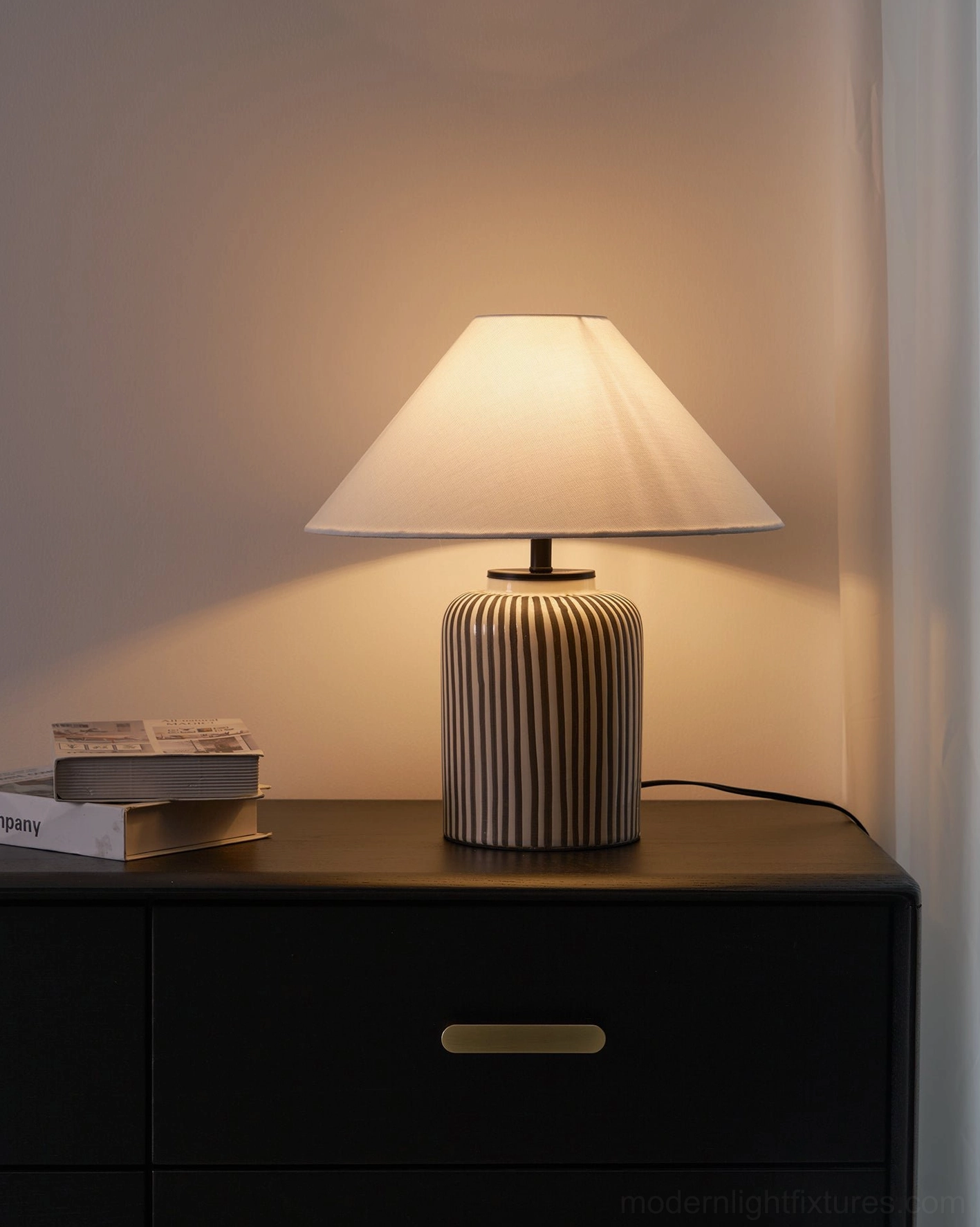 Striped table lamp with dimmer-compatible design for adjustable ambient bedroom lighting