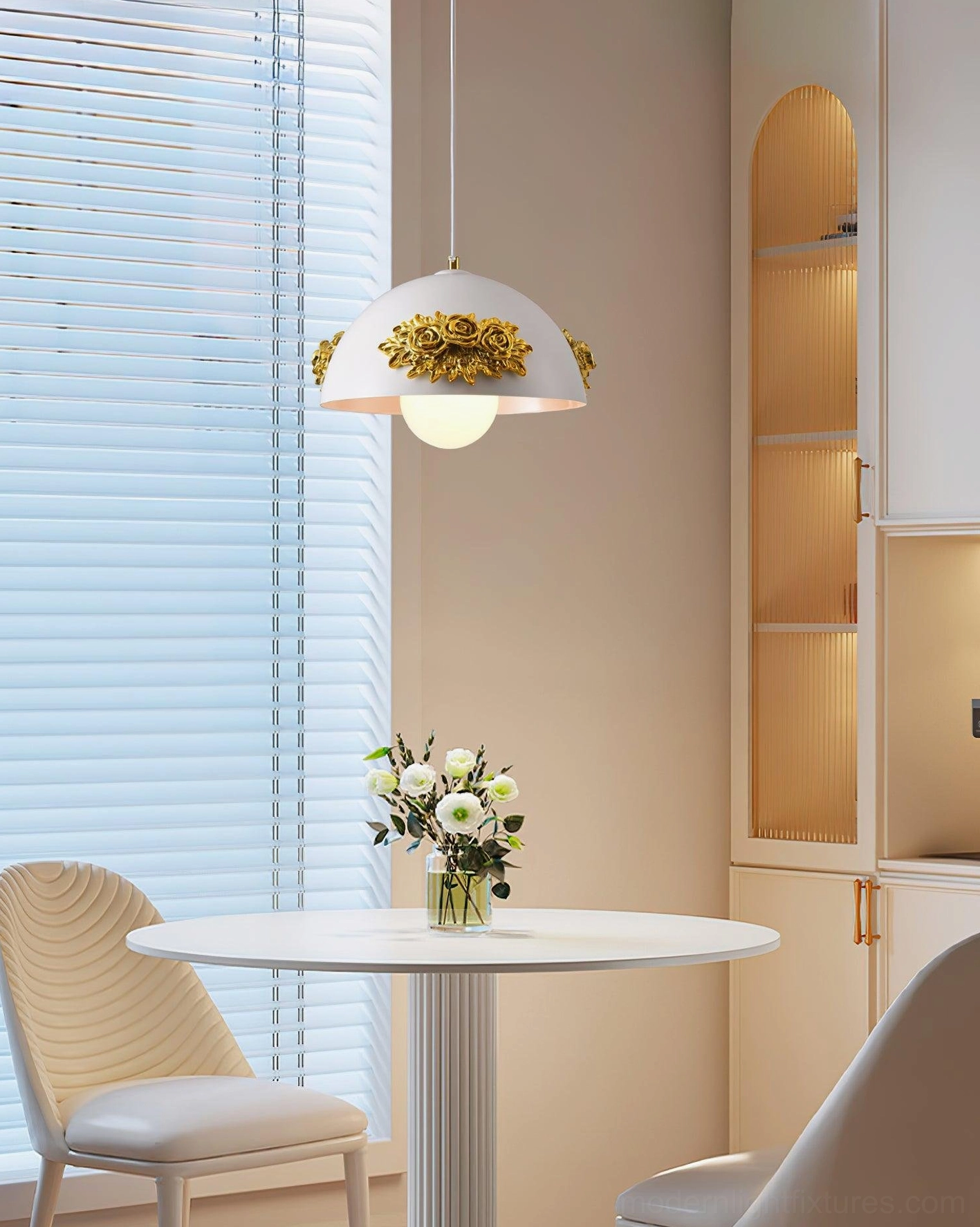 Single floral pendant light suspended over dining nook with window, warm glowing light through acrylic shade, fresh minimalist home decor