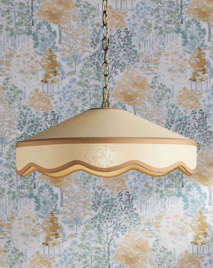 Dining table pendant light creating intimate ambient glow with scalloped fabric coolie shade