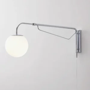 Modern Dione adjustable wall sconce front view showing spherical frosted glass shade and polished chrome finish