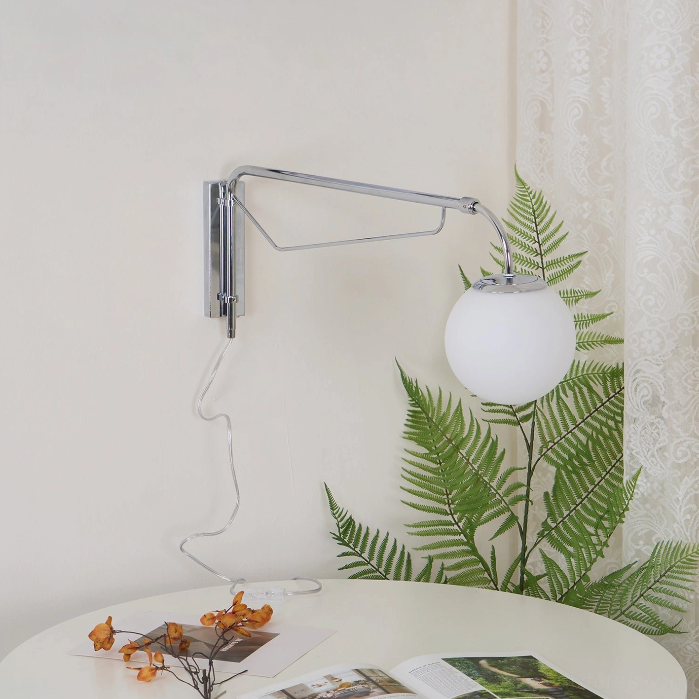 Dione swing arm wall sconce white color option frosted acrylic minimalist aesthetic