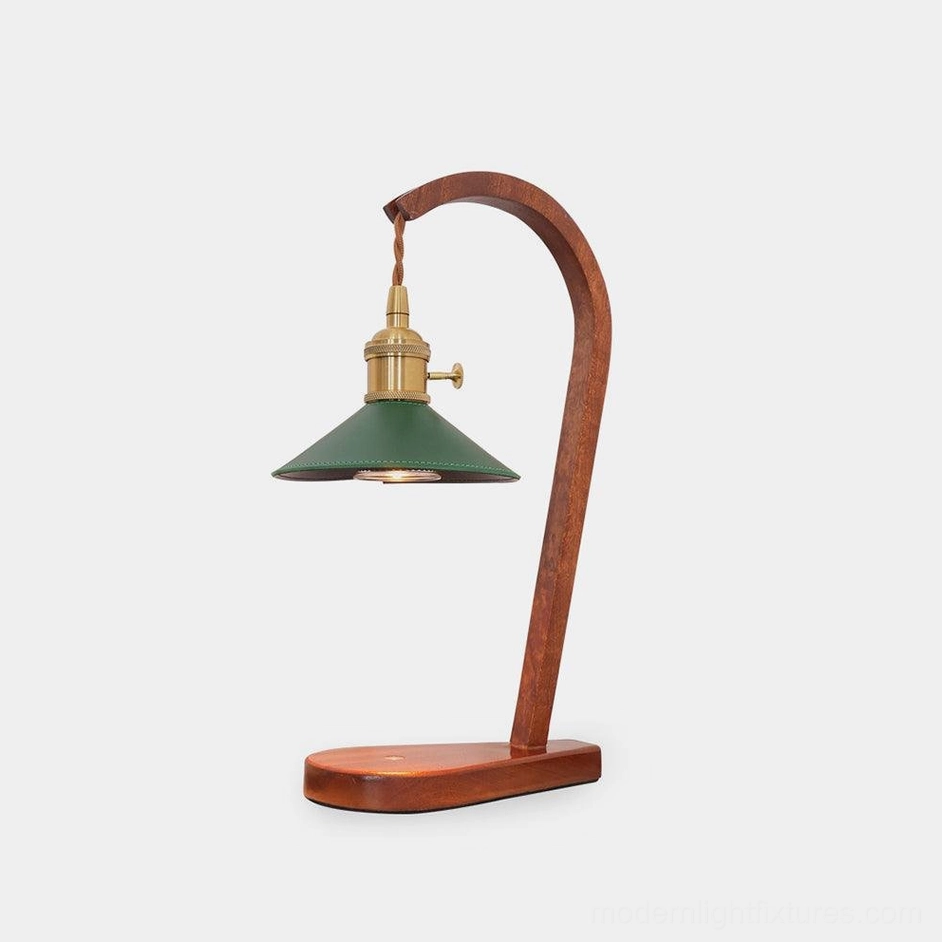 Diosa candle warmer table lamp with fabric shade and wood base in gold finish, studio product photo