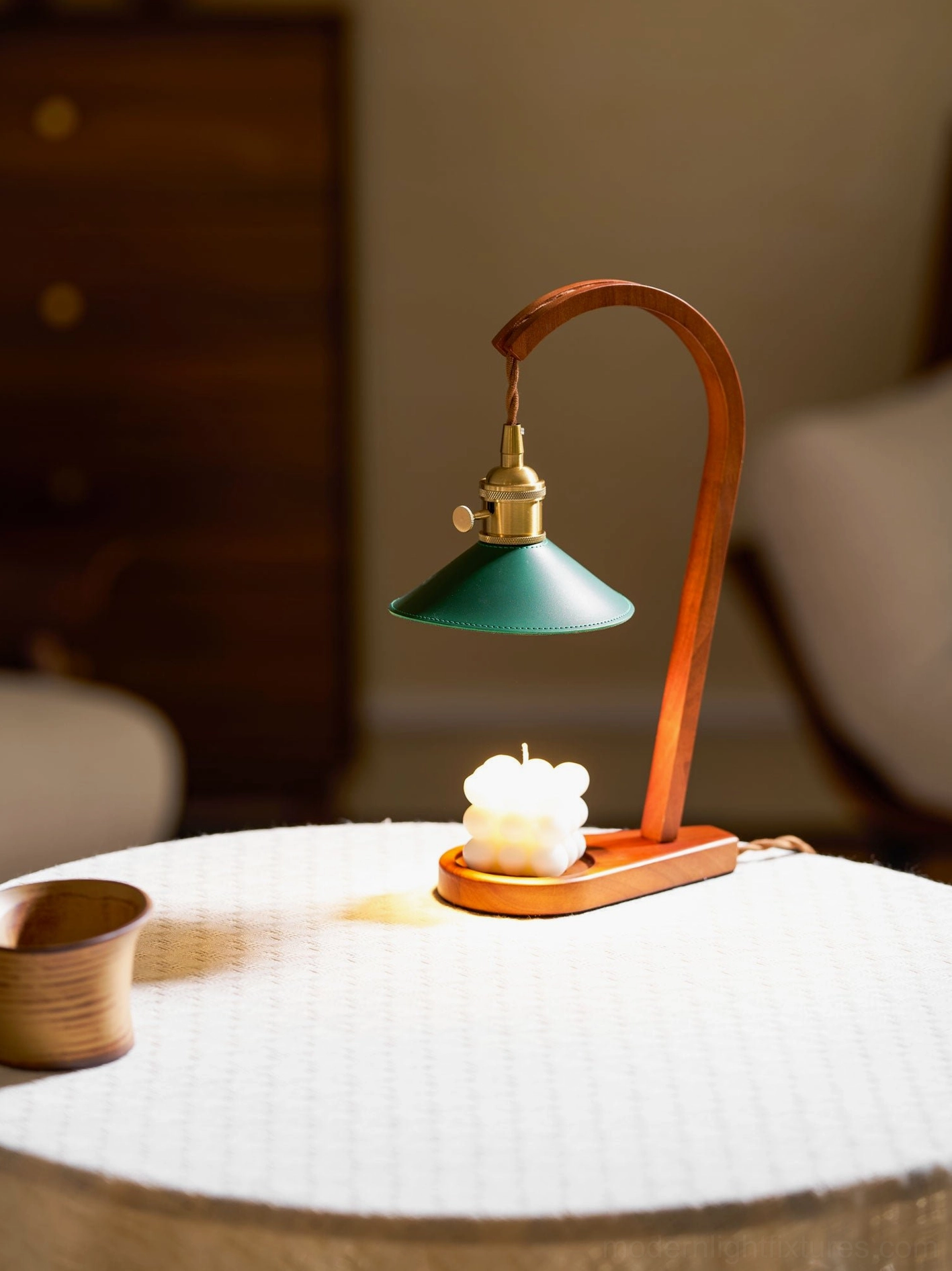 Diosa candle warmer table lamp rear view with decorative scented candle and warm home backdrop