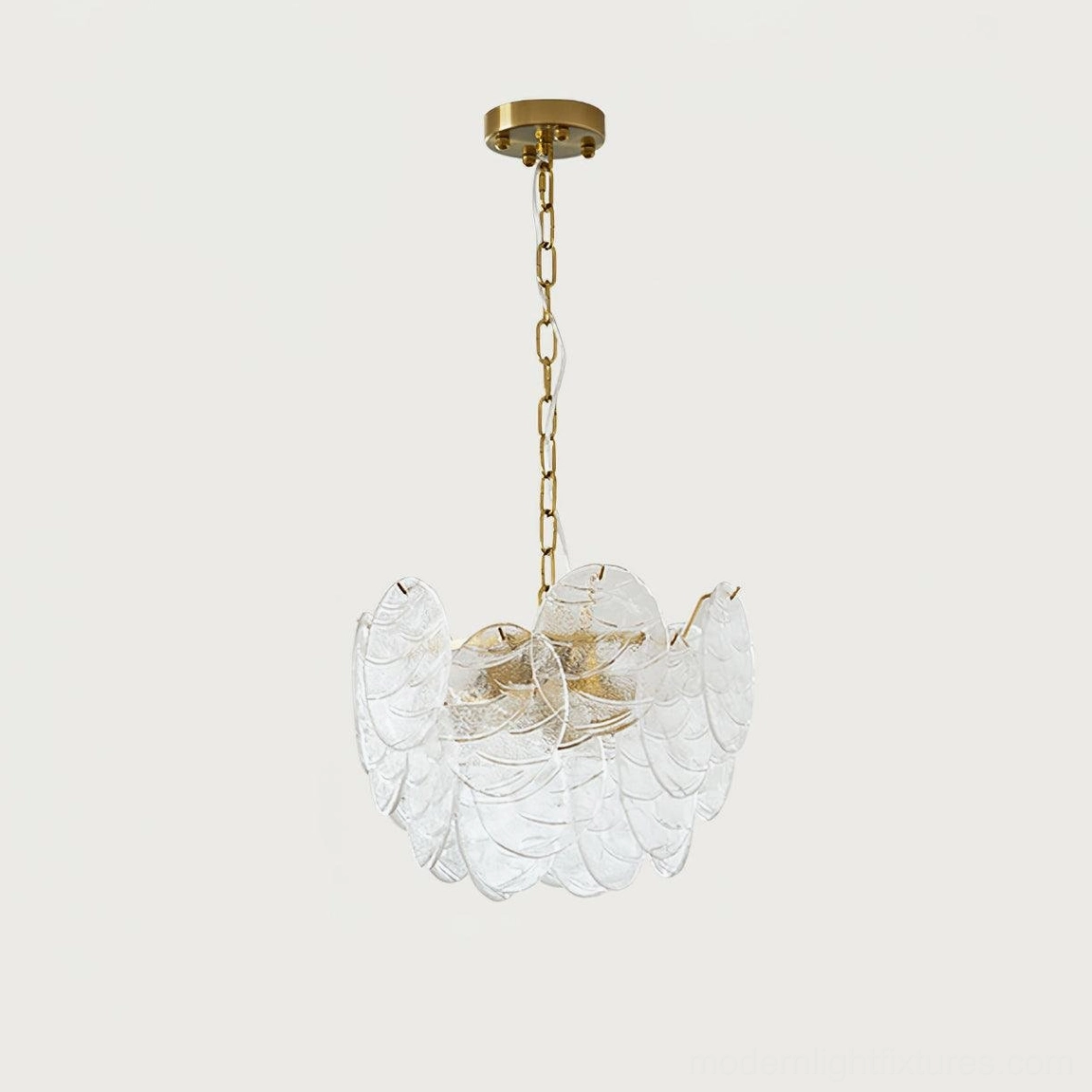 Victorian disc glass chandelier in bohemian luxury living room with curated decor
