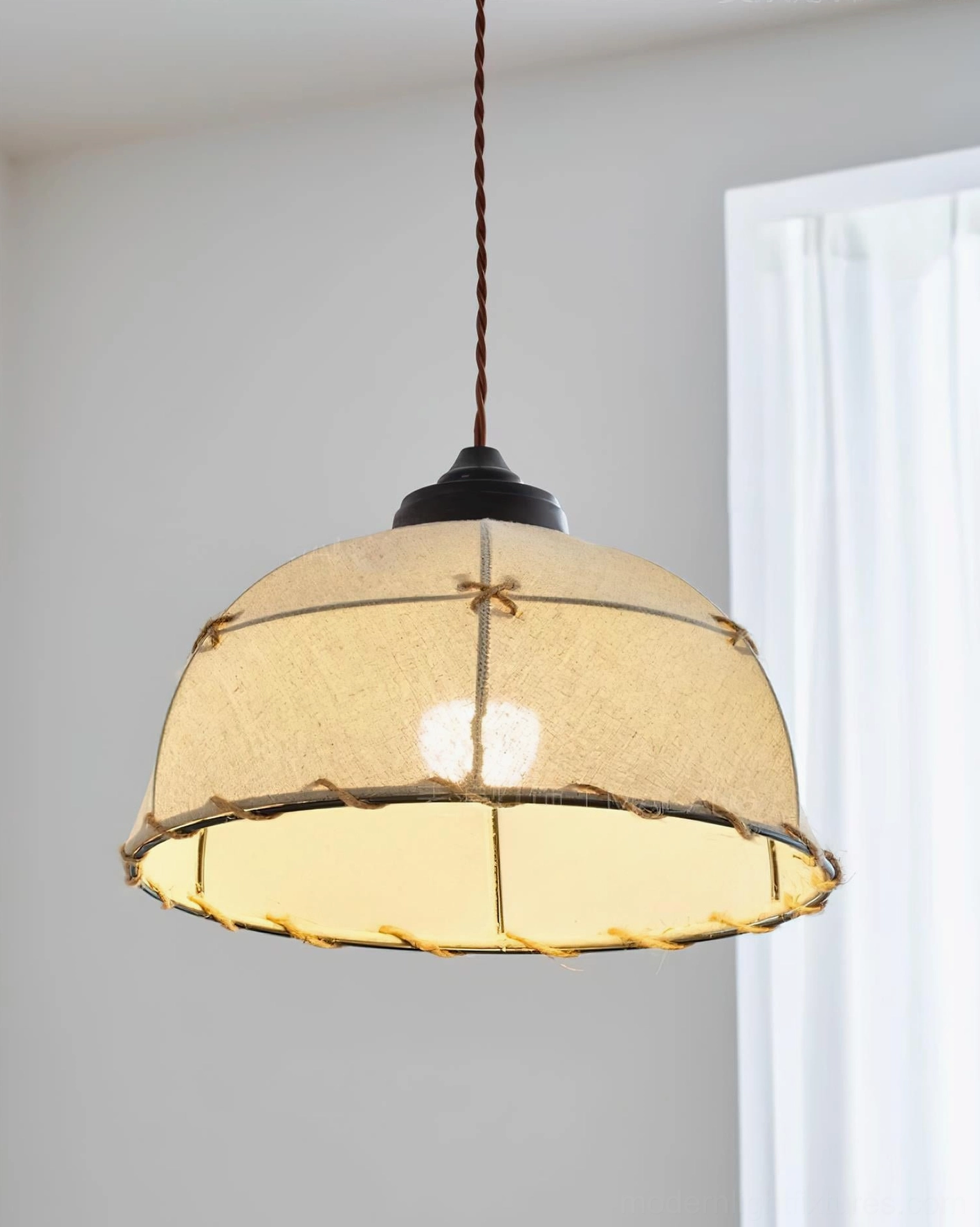 Artisan canvas dome pendant light three-quarter front view with twisted brown suspension cord, vintage decorative design in interior space with white sheer curtains